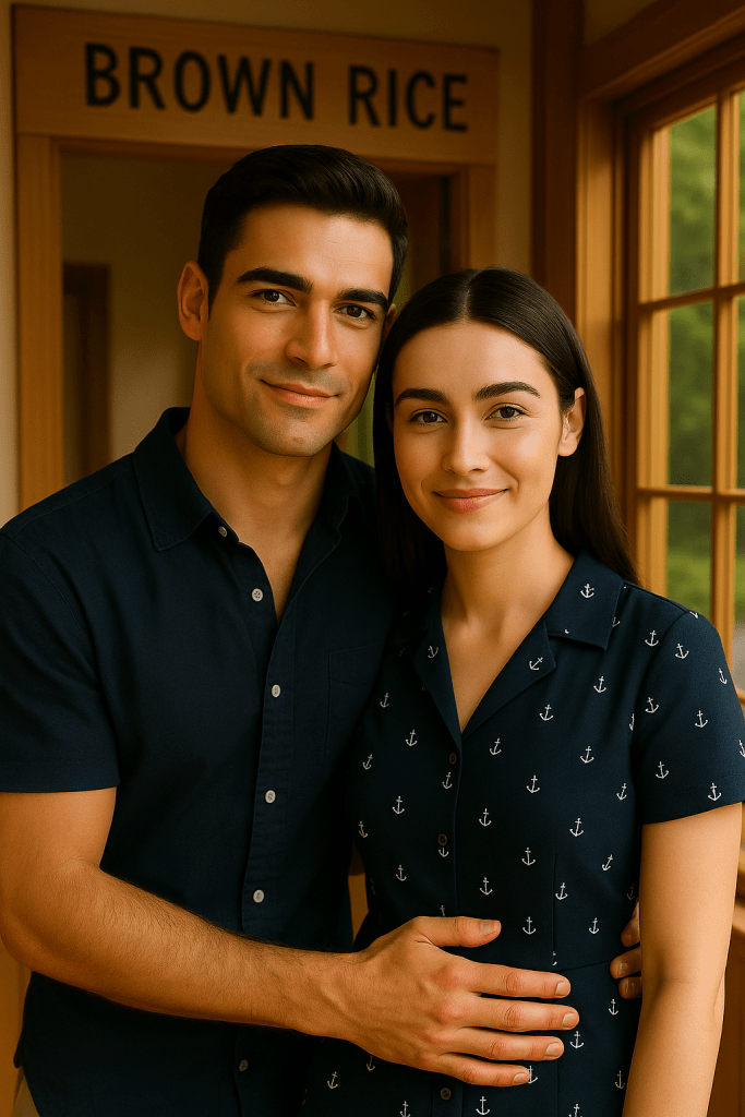 Natasha and Patrick smiling closely together inside Brown Rice restaurant, with Patrick gently holding Natasha as they meet again.
